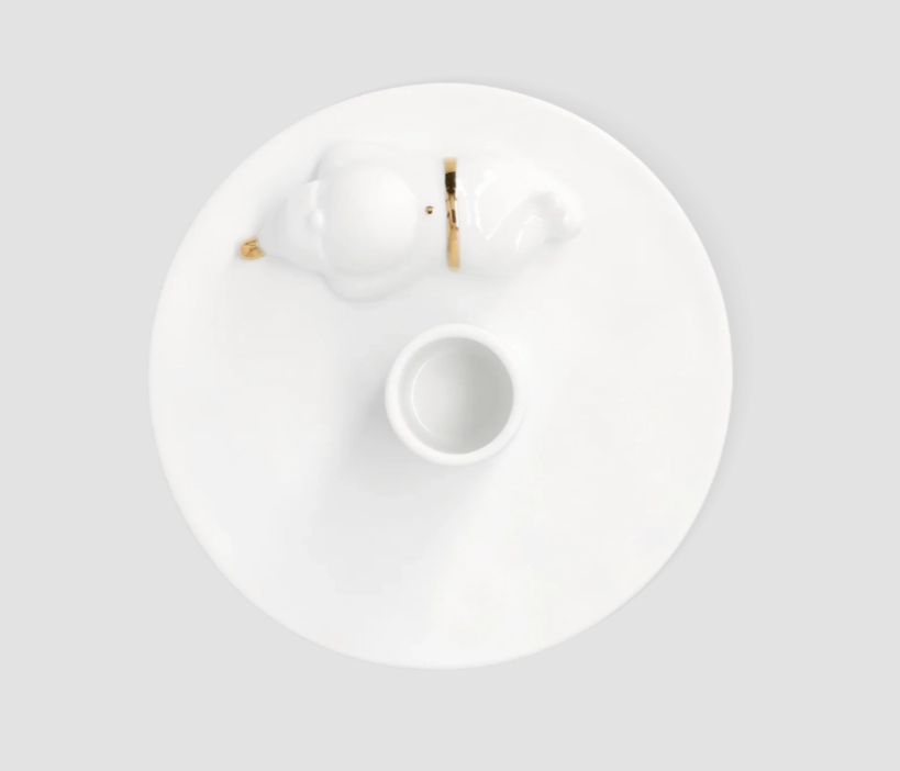 Decoratieve Räder Kandelaar met kerstsantaman voor sfeervolle feestdecoratie, afbeelding van een kerstfiguur en kaarsenhouder.